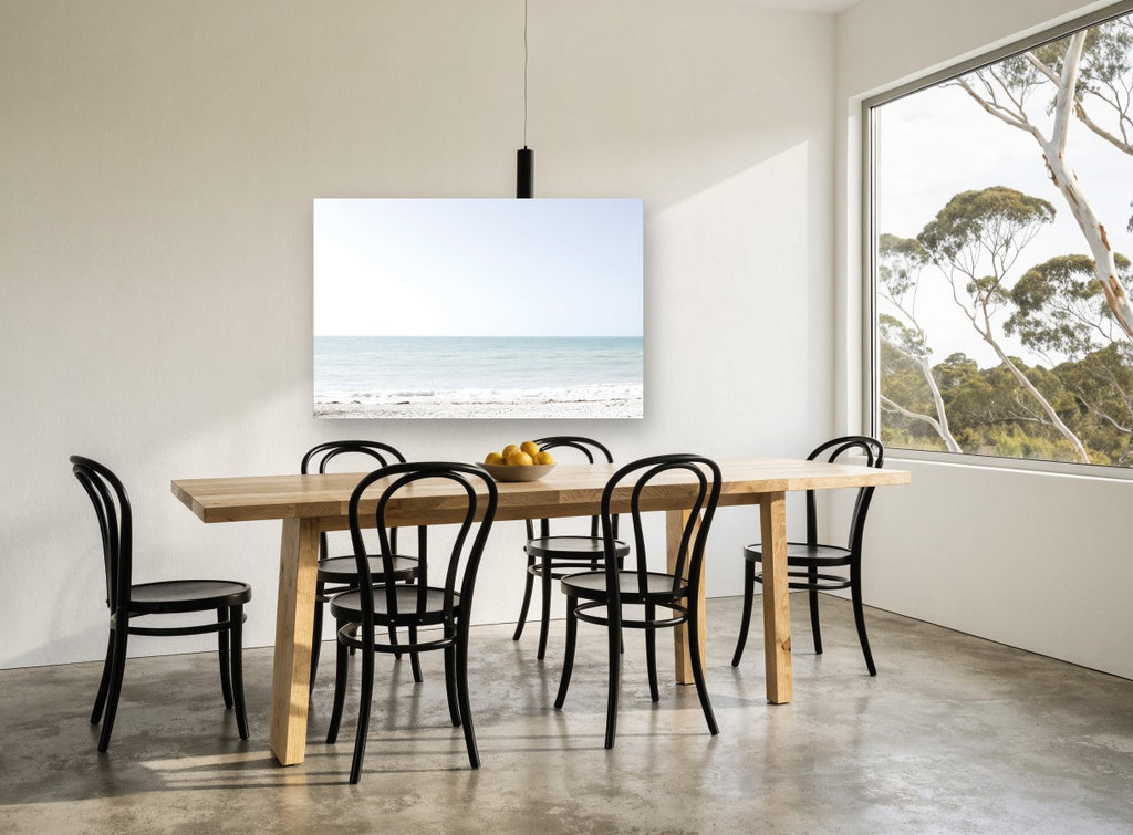 Pale Aqua Horizon coastal canvas print on the wall of a dining room