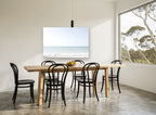 Pale Aqua Horizon coastal canvas print on the wall of a dining room