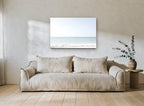 Pale Aqua Horizon coastal canvas print on the wall of a living room