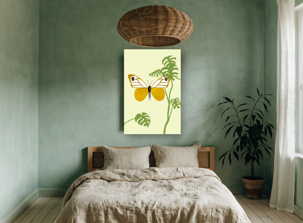 Gold Butterfly Monstera floral canvas print on the wall of a bedroom
