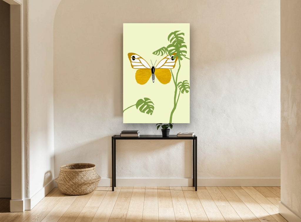 Gold Butterfly Monstera floral canvas print on the wall of a hallway