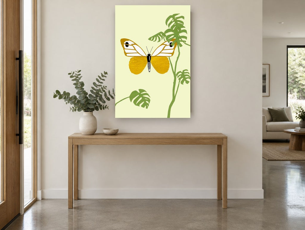 Gold Butterfly Monstera floral canvas print on the wall of a entry hall