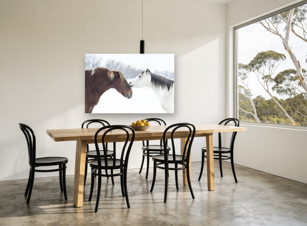 Winter Horses Nose to Nose landscape canvas print on the wall of a dining room