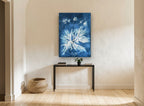 Indigo Seaweed Frond Burst vintage canvas print on the wall of a hallway