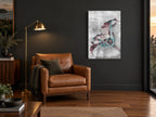 Inverted Lily Bloom floral canvas print on the wall of a charcoal living room