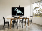 Lily in X-Ray Glow floral canvas print on the wall of a dining room