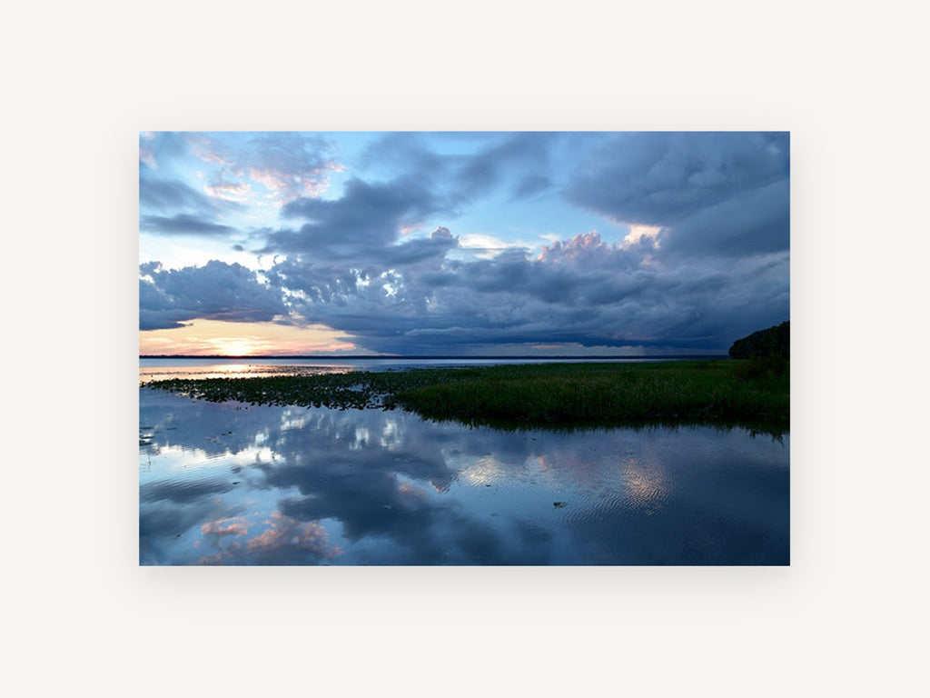 Storm Over Still Water, stormy sunset lake reflection photograph, landscape canvas wall art print, front view