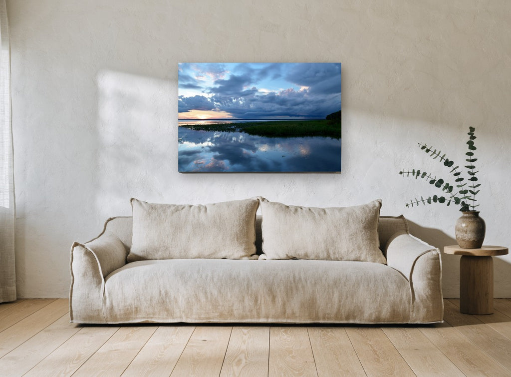 Storm Over Still Water landscape canvas print on the wall of a living room