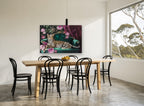 Leopard on Emerald Sofa floral canvas print on the wall of a dining room