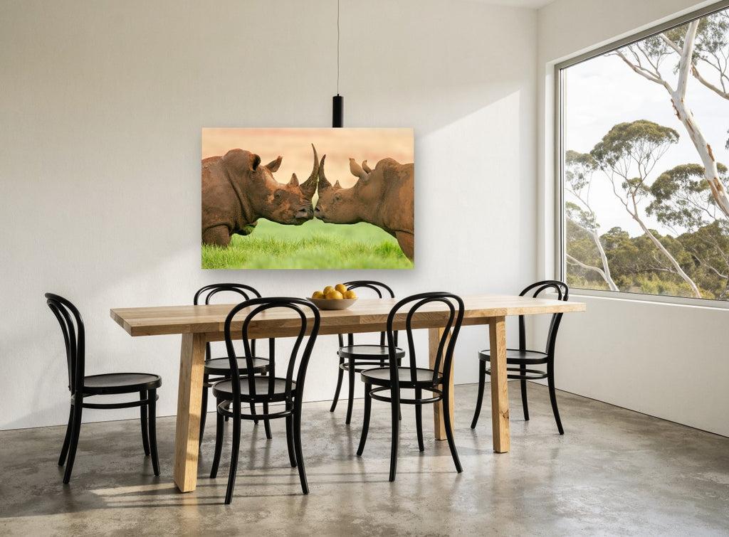 Mud-Caked Rhino Greeting animal canvas print on the wall of a dining room