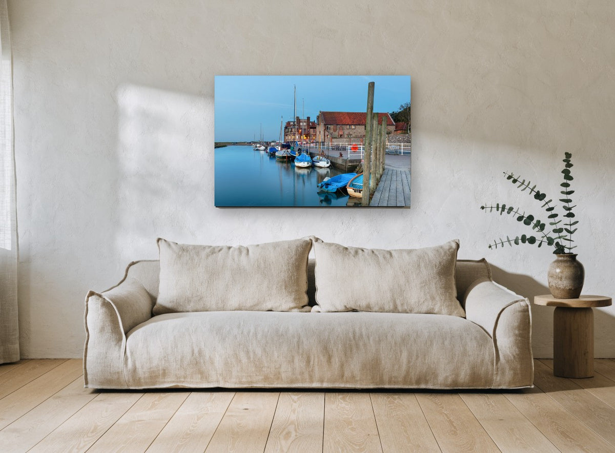 Blakeney Quay at Dusk coastal canvas print on the wall of a living room