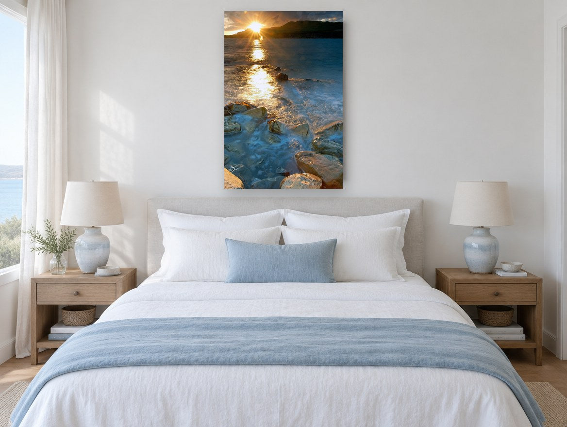 Sunburst Over Rocky Shallows coastal canvas print on the wall of a coastal bedroom