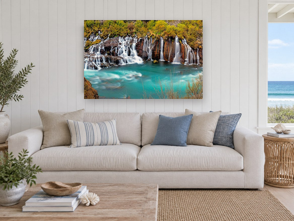 Turquoise Cascade Pool landscape canvas print on the wall of a beach house living room
