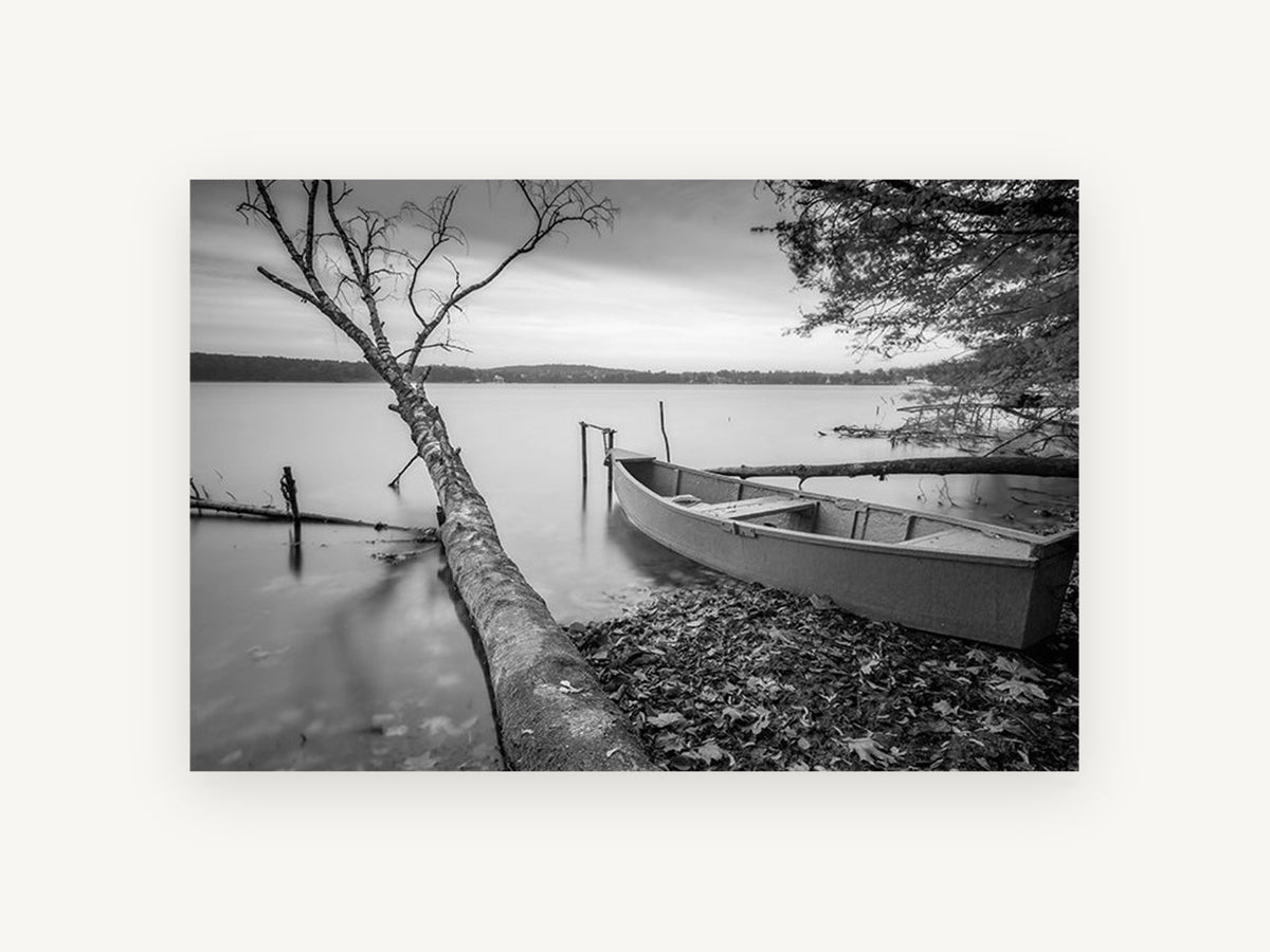 Still Shore Rowboat, black and white lake boat photograph, landscape canvas wall art print, front view