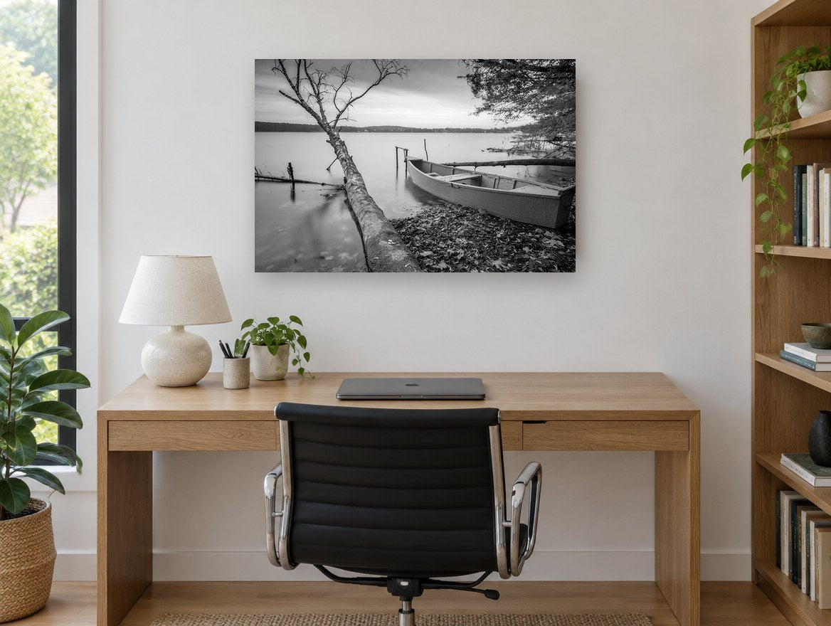 Still Shore Rowboat landscape canvas print on the wall of a study