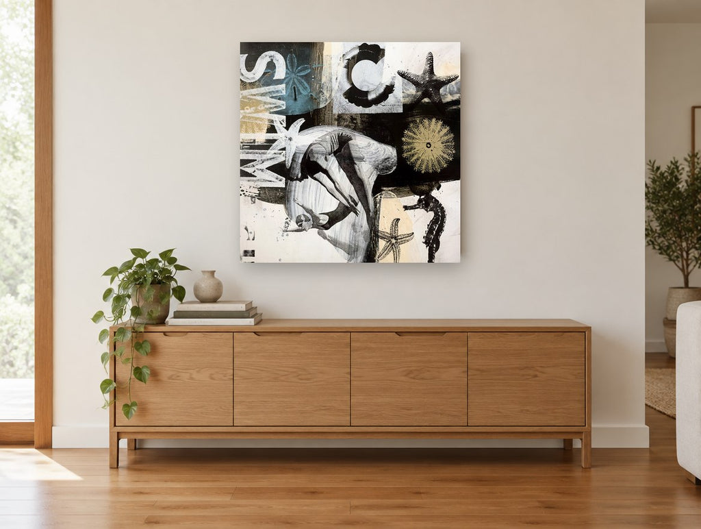 Diver Among Sea Stars vintage canvas print on the wall of a living room above a sideboard