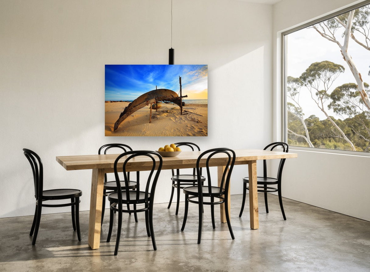 Upturned Boat Sunset Sands coastal canvas print on the wall of a dining room