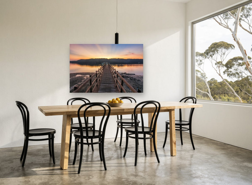 Jetty at First Light coastal canvas print on the wall of a dining room