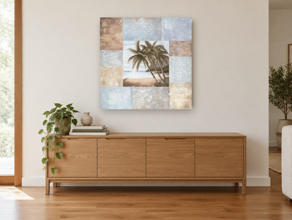 Palms and Patchwork Panels coastal canvas print on the wall of a living room above a sideboard