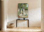 Sunlit Garden Gate floral canvas print on the wall of a hallway
