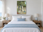 Sunlit Garden Gate floral canvas print on the wall of a coastal bedroom