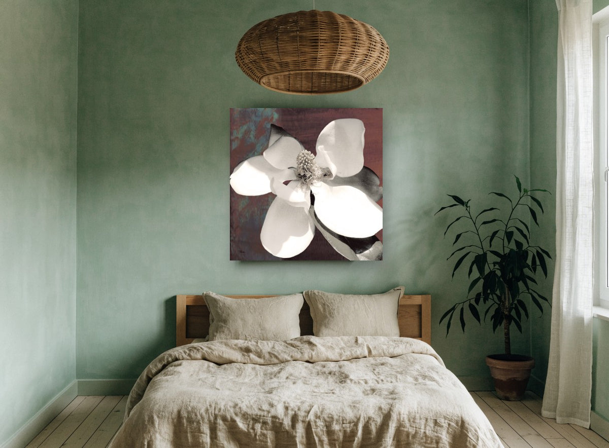 Open Magnolia on Rust floral canvas print on the wall of a bedroom