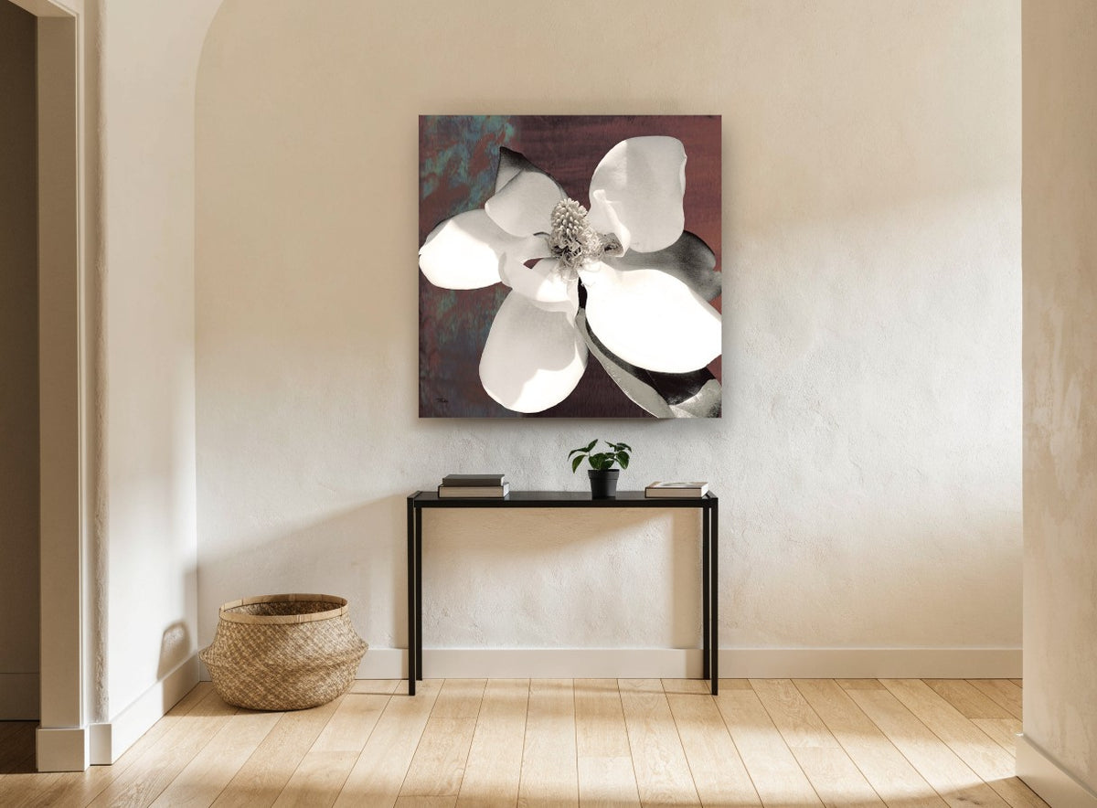 Open Magnolia on Rust floral canvas print on the wall of a hallway
