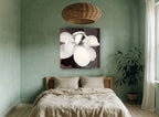 Open Cream Magnolia floral canvas print on the wall of a bedroom