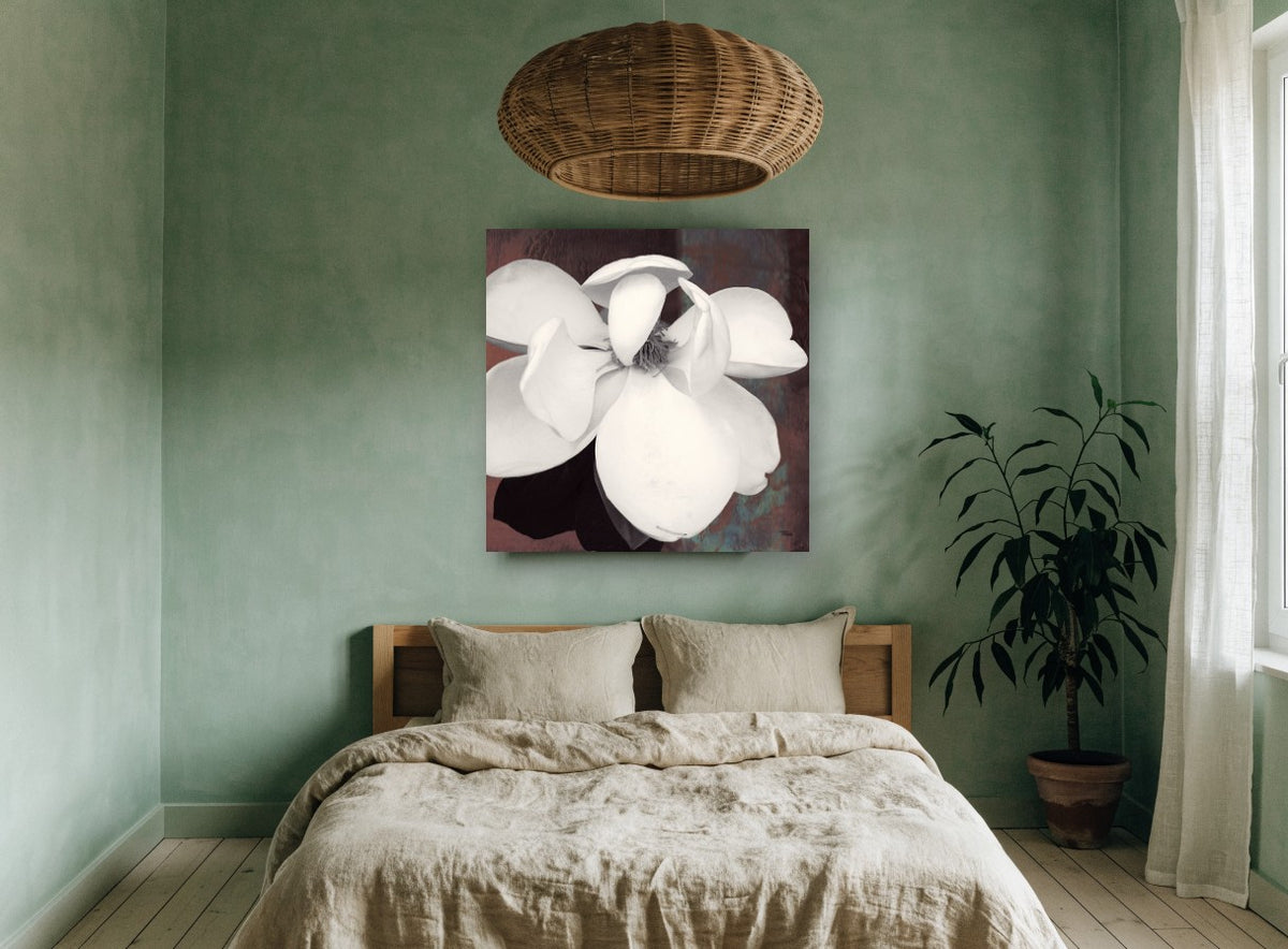 Open Cream Magnolia floral canvas print on the wall of a bedroom