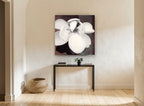 Open Cream Magnolia floral canvas print on the wall of a hallway