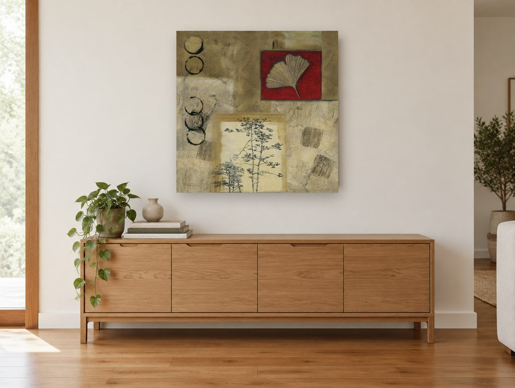 Ginkgo and Pine Collage floral canvas print on the wall of a living room above a sideboard