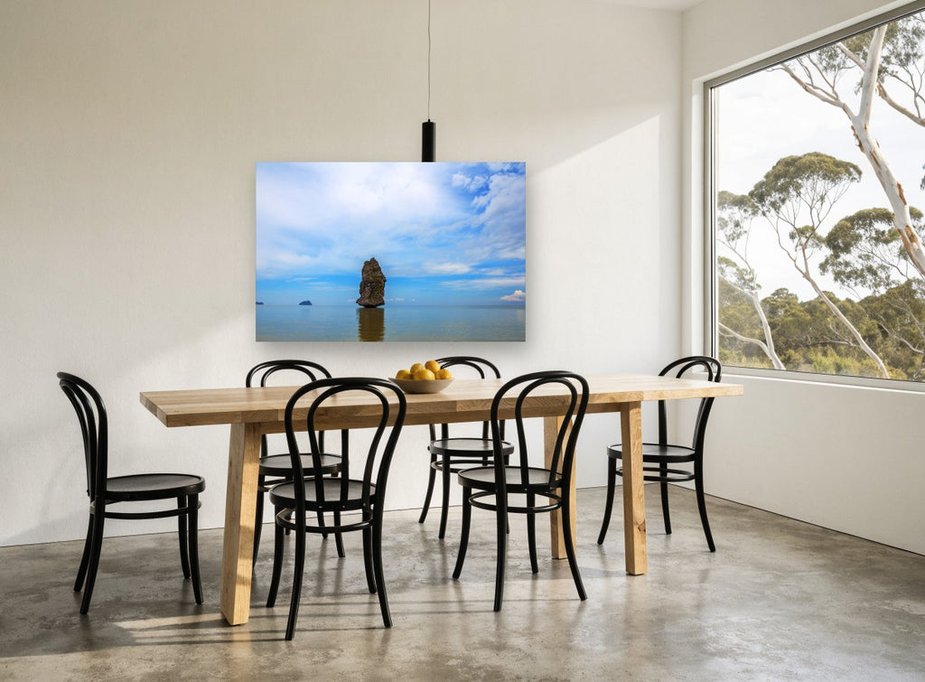 Lone Sea Stack coastal canvas print on the wall of a dining room