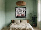 Live Life Take Two vintage canvas print on the wall of a bedroom