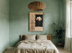 Lily on Black Scrollwork floral canvas print on the wall of a bedroom