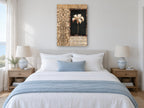Lily on Black Scrollwork floral canvas print on the wall of a coastal bedroom