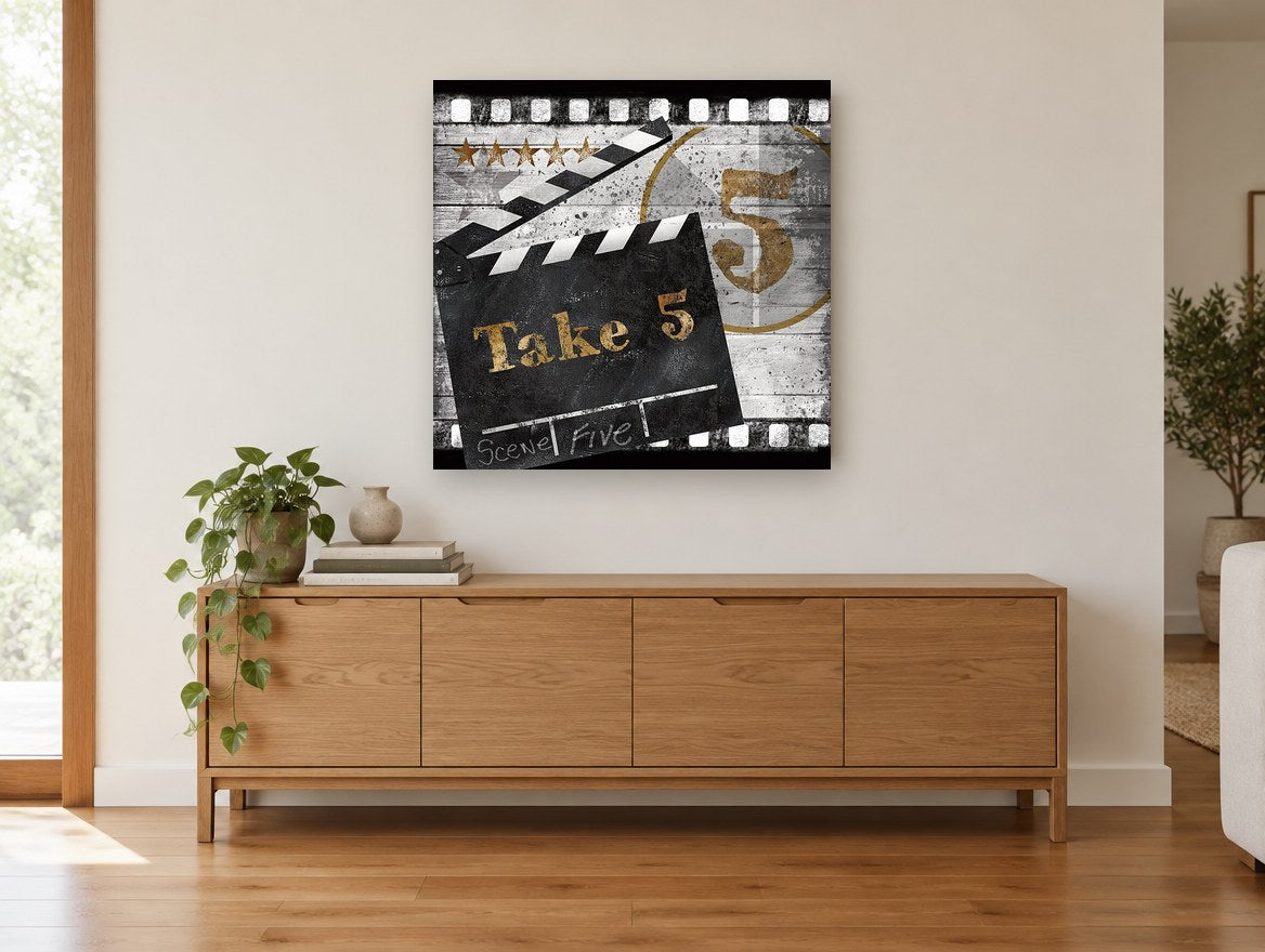 Take 5 Clapperboard vintage canvas print on the wall of a living room above a sideboard