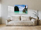 Longtail Boat Lagoon coastal canvas print on the wall of a living room