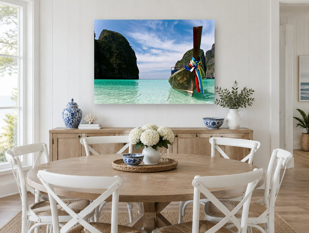 Longtail Boat Lagoon coastal canvas print on the wall of a Hamptons dining room