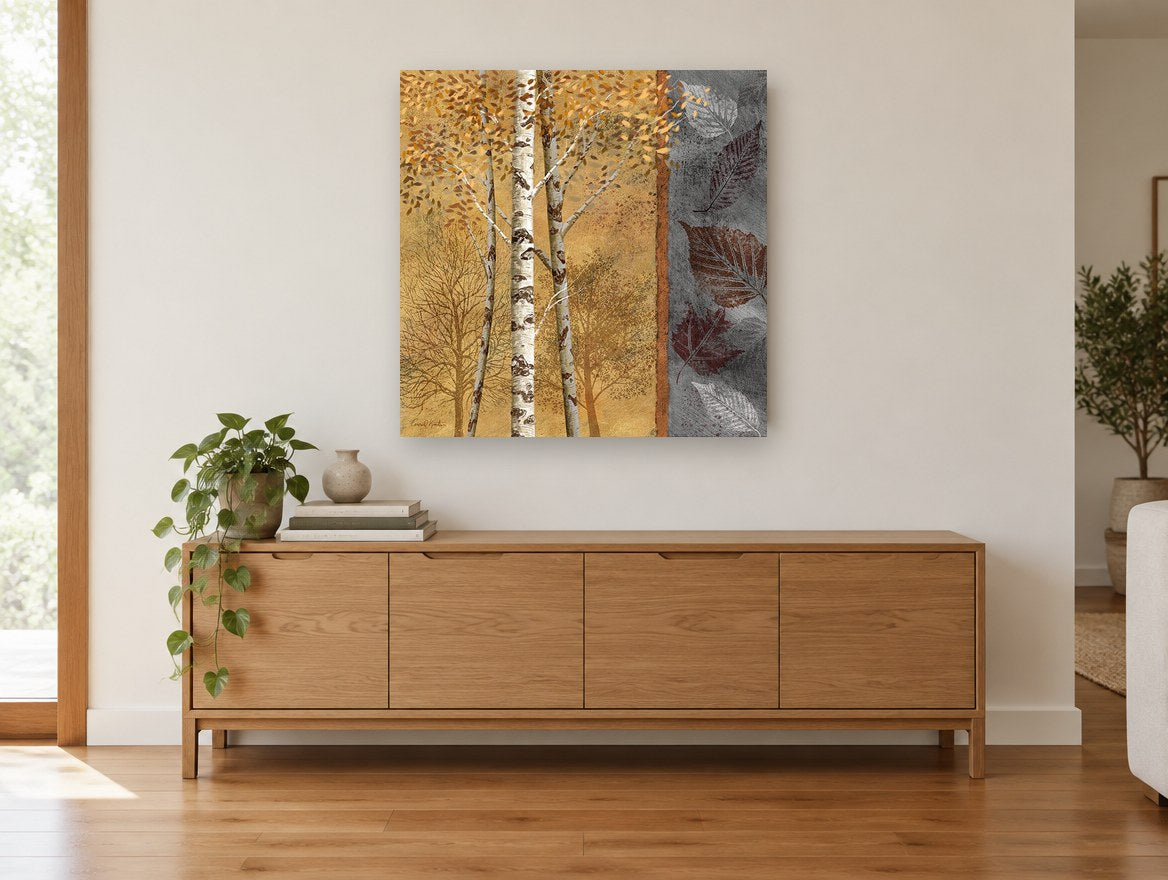 Birch Leaves Amber landscape canvas print on the wall of a living room above a sideboard