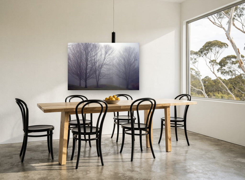 Bare Trees in Fog landscape canvas print on the wall of a dining room