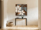 Cream Blooms on Chocolate floral canvas print on the wall of a hallway