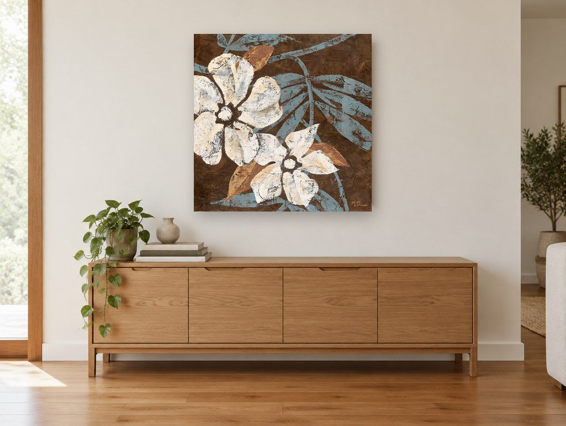 Cream Blooms on Chocolate floral canvas print on the wall of a living room above a sideboard