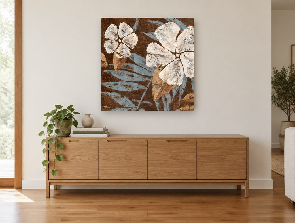 Cream Blooms on Chocolate floral canvas print on the wall of a living room above a sideboard