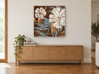 Cream Blooms on Chocolate floral canvas print on the wall of a living room above a sideboard