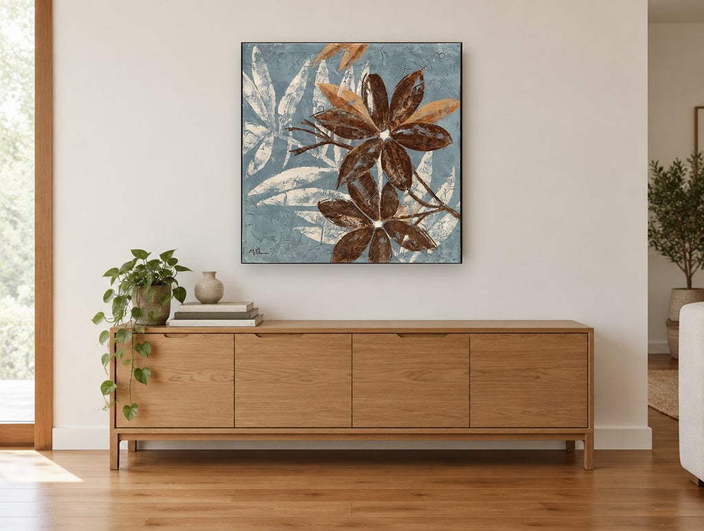 Chocolate Blooms on Slate floral canvas print on the wall of a living room above a sideboard
