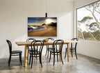 Golden Hour Shorebreak coastal canvas print on the wall of a dining room