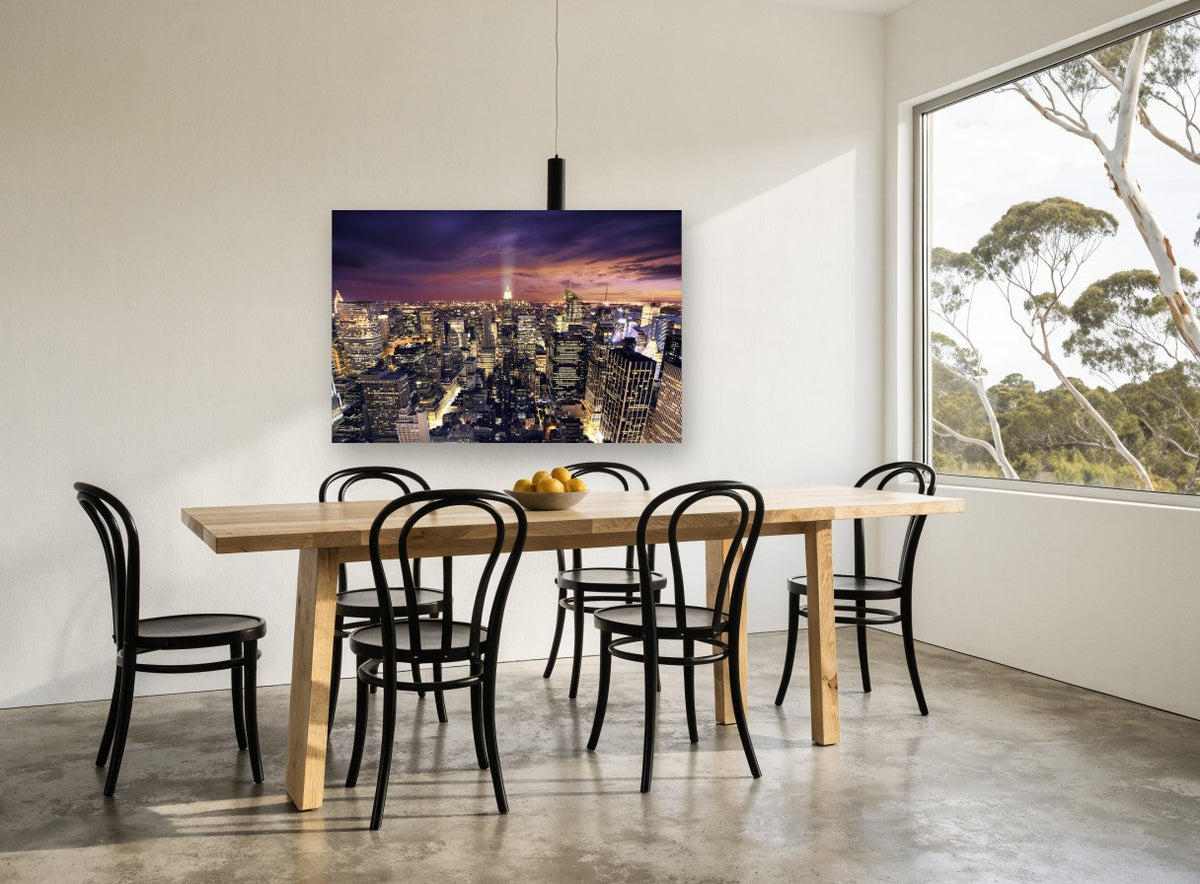 Manhattan Dusk Glow city canvas print on the wall of a dining room