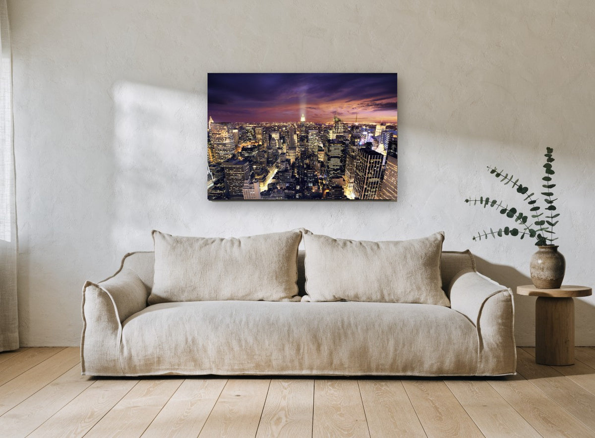 Manhattan Dusk Glow city canvas print on the wall of a living room