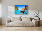 Longtail Boat Lagoon coastal canvas print on the wall of a living room