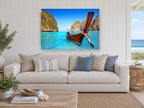 Longtail Boat Lagoon coastal canvas print on the wall of a beach house living room